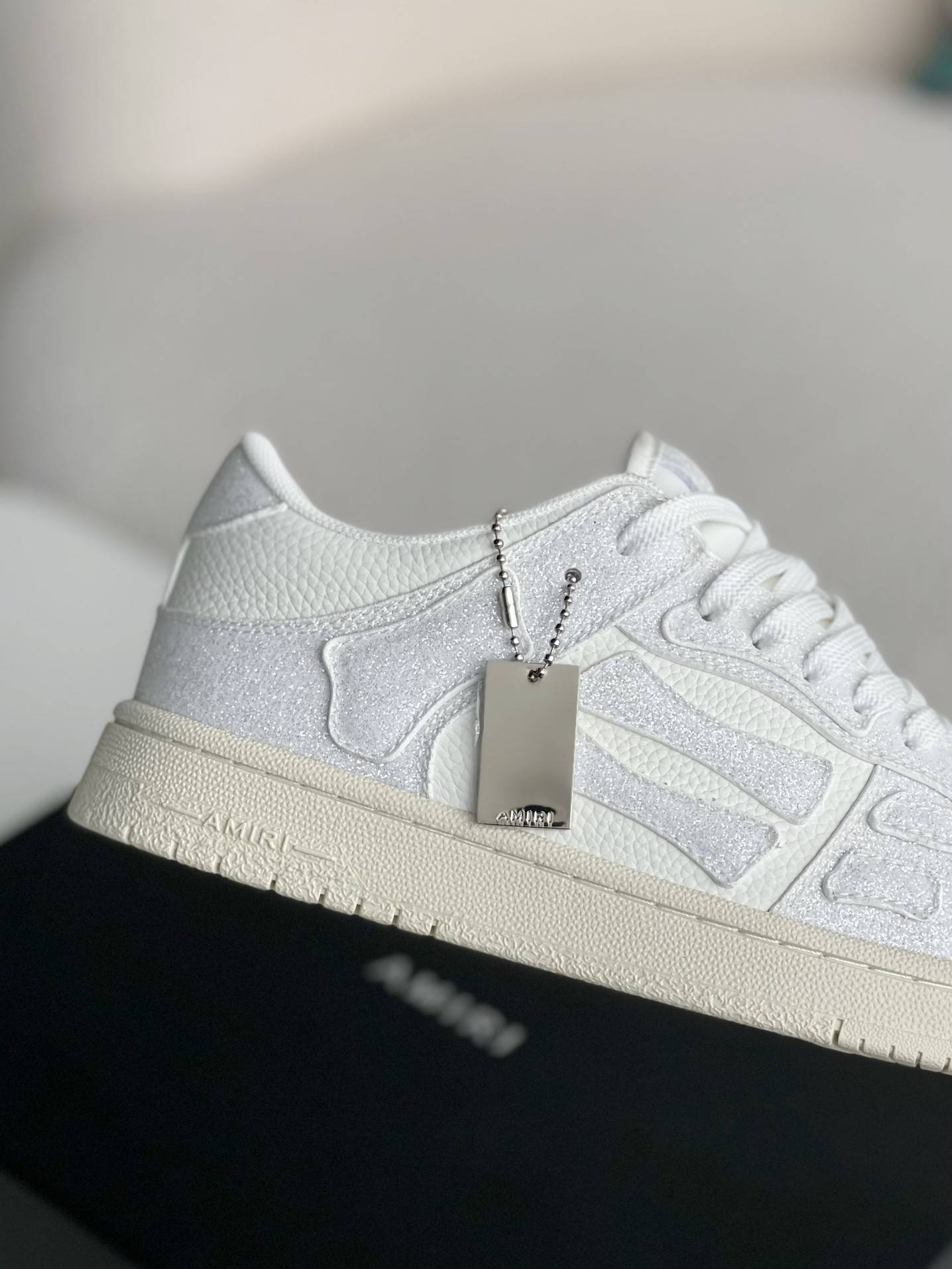 A*RI Bone Sneakers