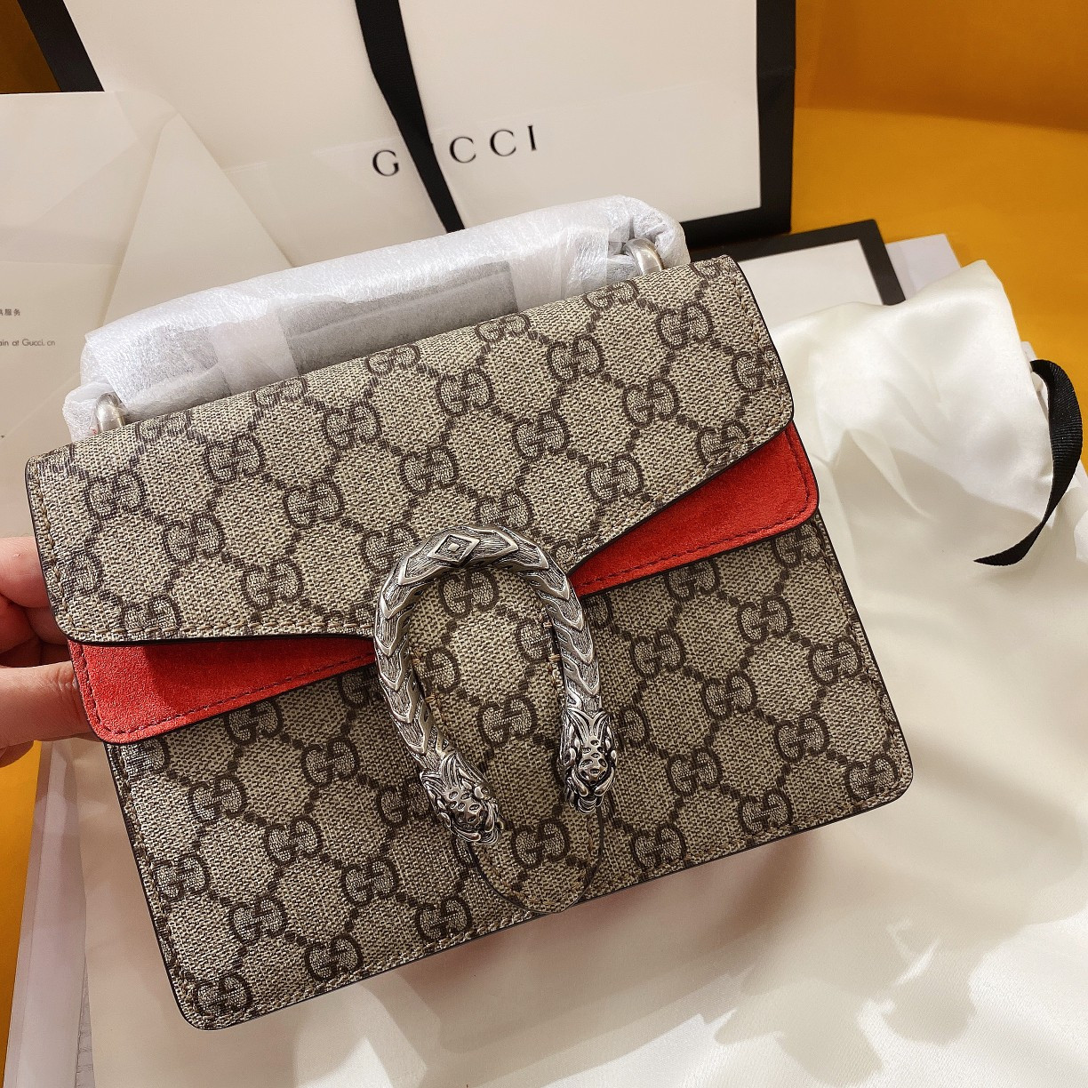 G*u*i dionysus bag